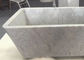 Tina de piedra natural modificada para requisitos particulares, baño de mármol blanco con las venas grises proveedor